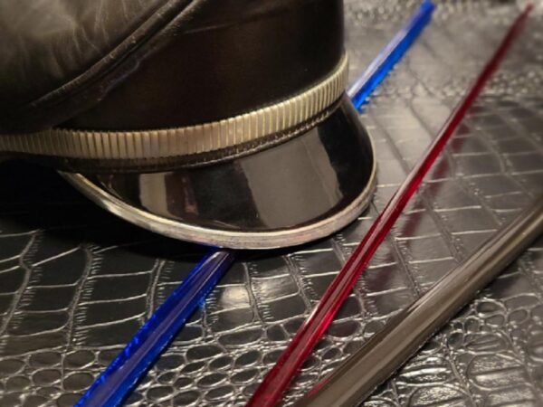 Muir cap on faux leather, red, black and blue acrylic rods